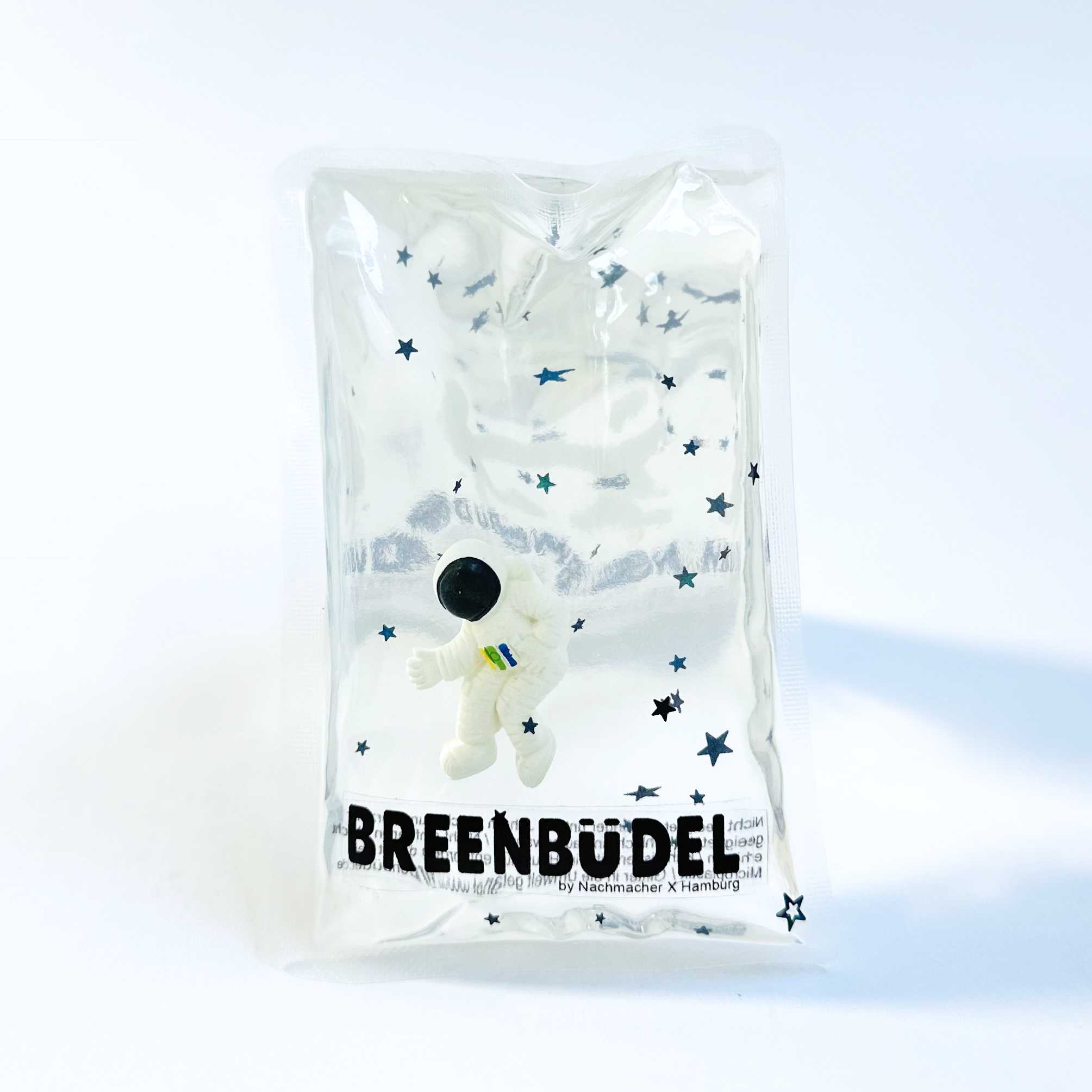 BREENBÜDEL Kühlkissen Motiv Fliegender Astronaut