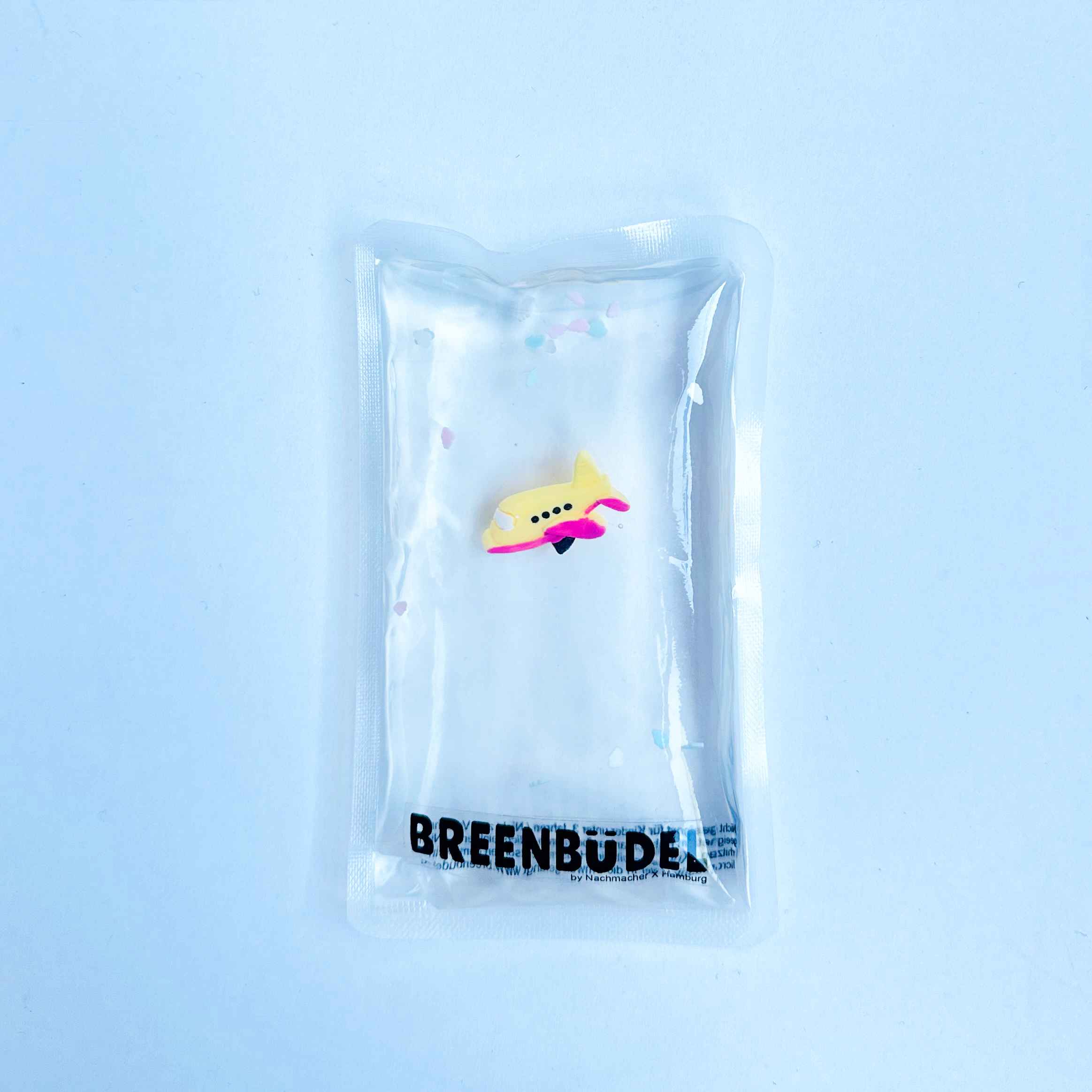 BREENBÜDEL Kühlkissen - Motiv Flugzeug rosa-gelb